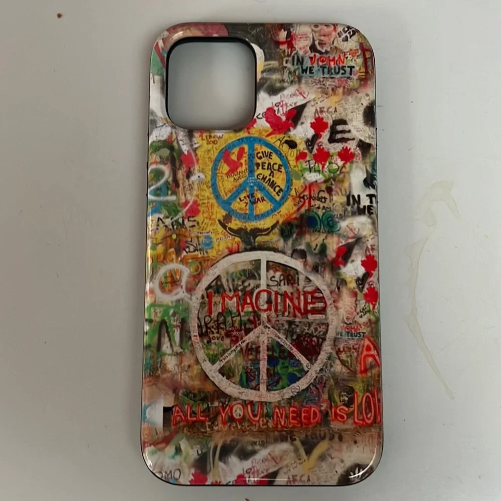 Society 6- iPhone 12 Graffiti design. Never used. Bought wrong size.